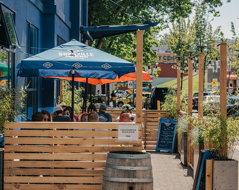 area restaurant with people eating outside the brewery