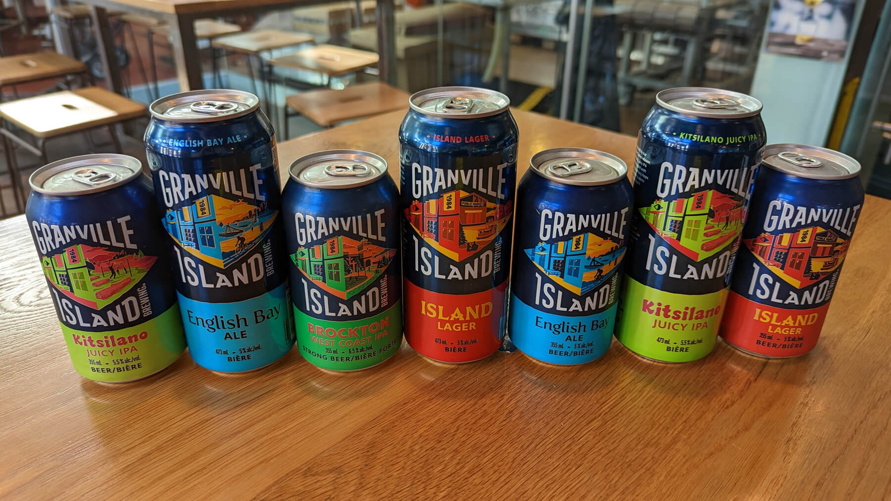 all granville beer cans on a bar