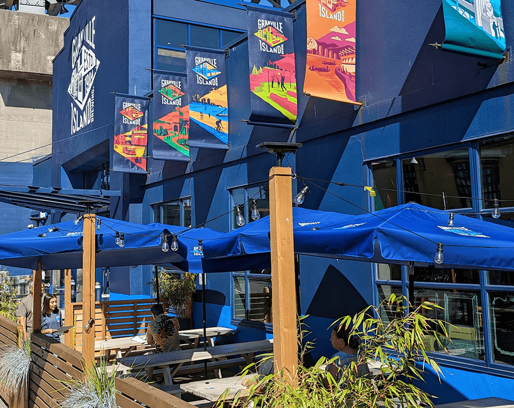 People sitting on the outside of the brewery