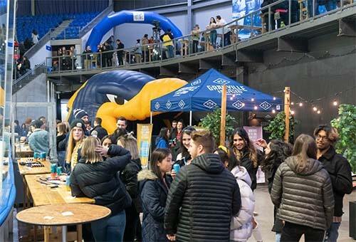 people chatting in a granville festival