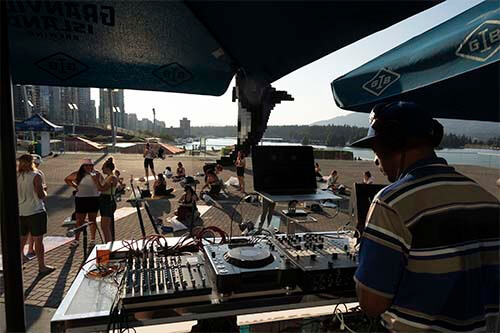 DJ playing music in a festival