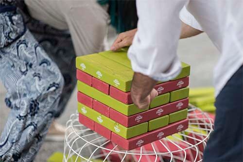person buildings jenga game