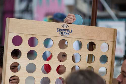 persons play connect four game