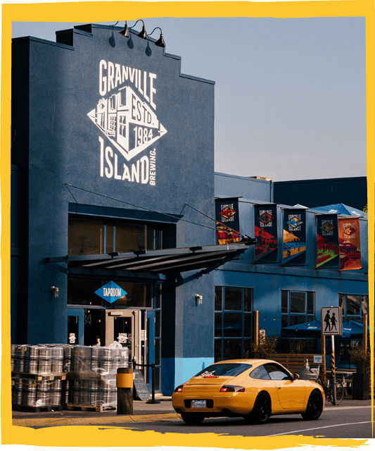 granville brewery with a yellow sport car in front