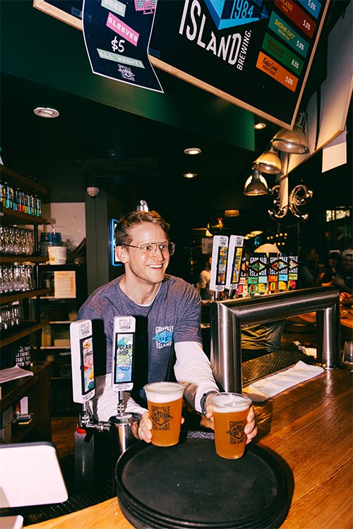 person serving granville beers