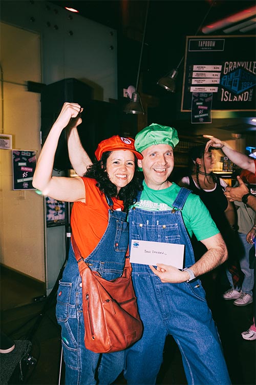 people dressed as Mario and Luigi bros