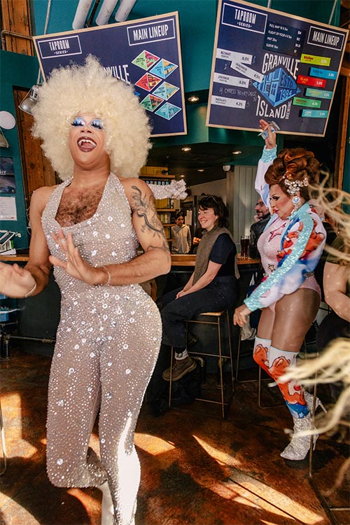 drags queen happing and dancing in a granville brewery