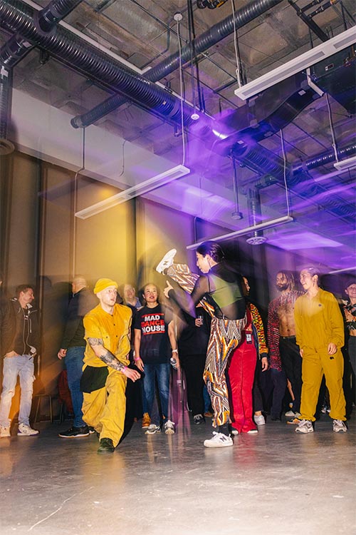 people dancing break dance style
