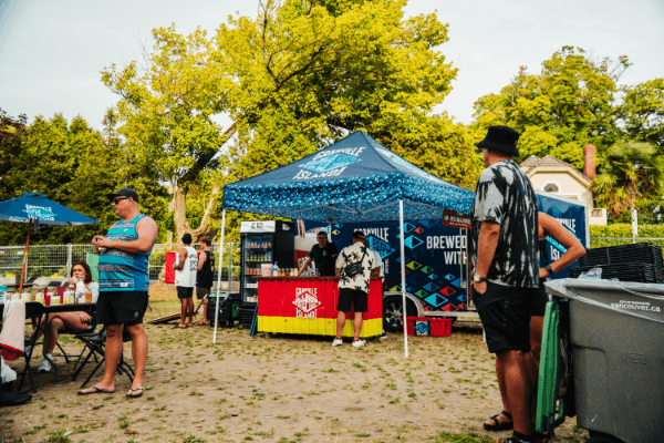 granville stand and person shopping