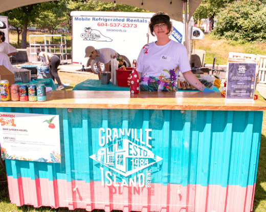 person attending granville bar stand