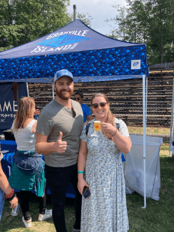 people posing for photo with beer in hand